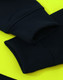 A close-up of a black fleece hoodie with bright yellow accents, featuring ribbed cuffs and a logo.