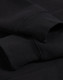 A black 1/2 zip collar fleecy jumper with visible sleeve cuffs and a subtle logo.