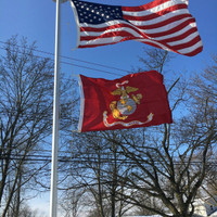 United States Marine Corps Flag flying proudly. 2'x3' under a 3'x5' American Flag on the 21' Classic Flag Pole. All 100% Made in the U.S.A.