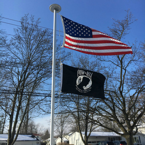 POW/MIA Flag flying proudly. 2'x3' under a 3'x5' American Flag on the 21' Classic Flag Pole. All 100% Made in the U.S.A.