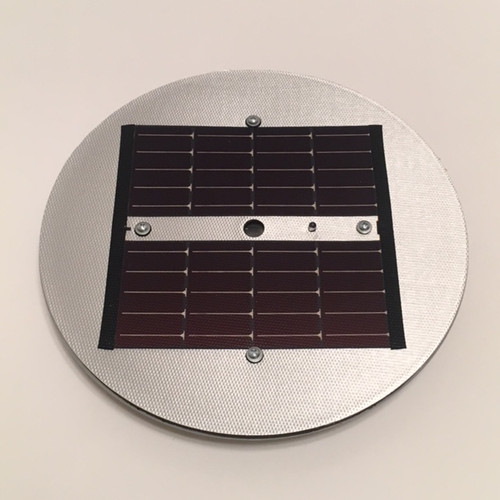 Titan Solar Disc Light: Top made of aluminum, with solar panels. Made in USA