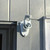 White Cast Aluminum 2 position flag pole Bracket mounted on home. Made in U.S.A.