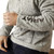 Ariat Men's Nulla Heather Caldwell Logo 1/4 Zip Sweater