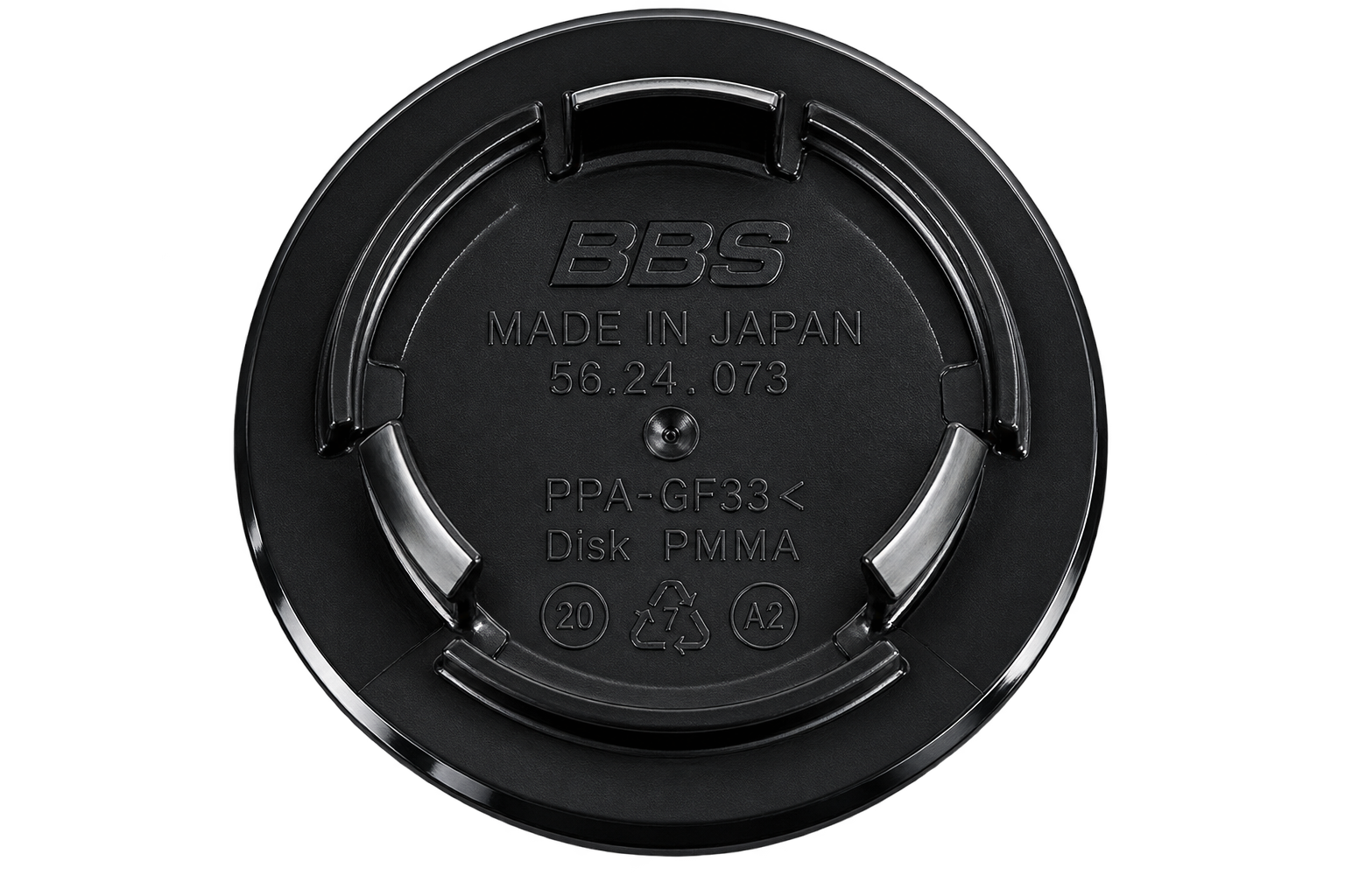 Backside of a BBS Type B center cap showing three retention tabs