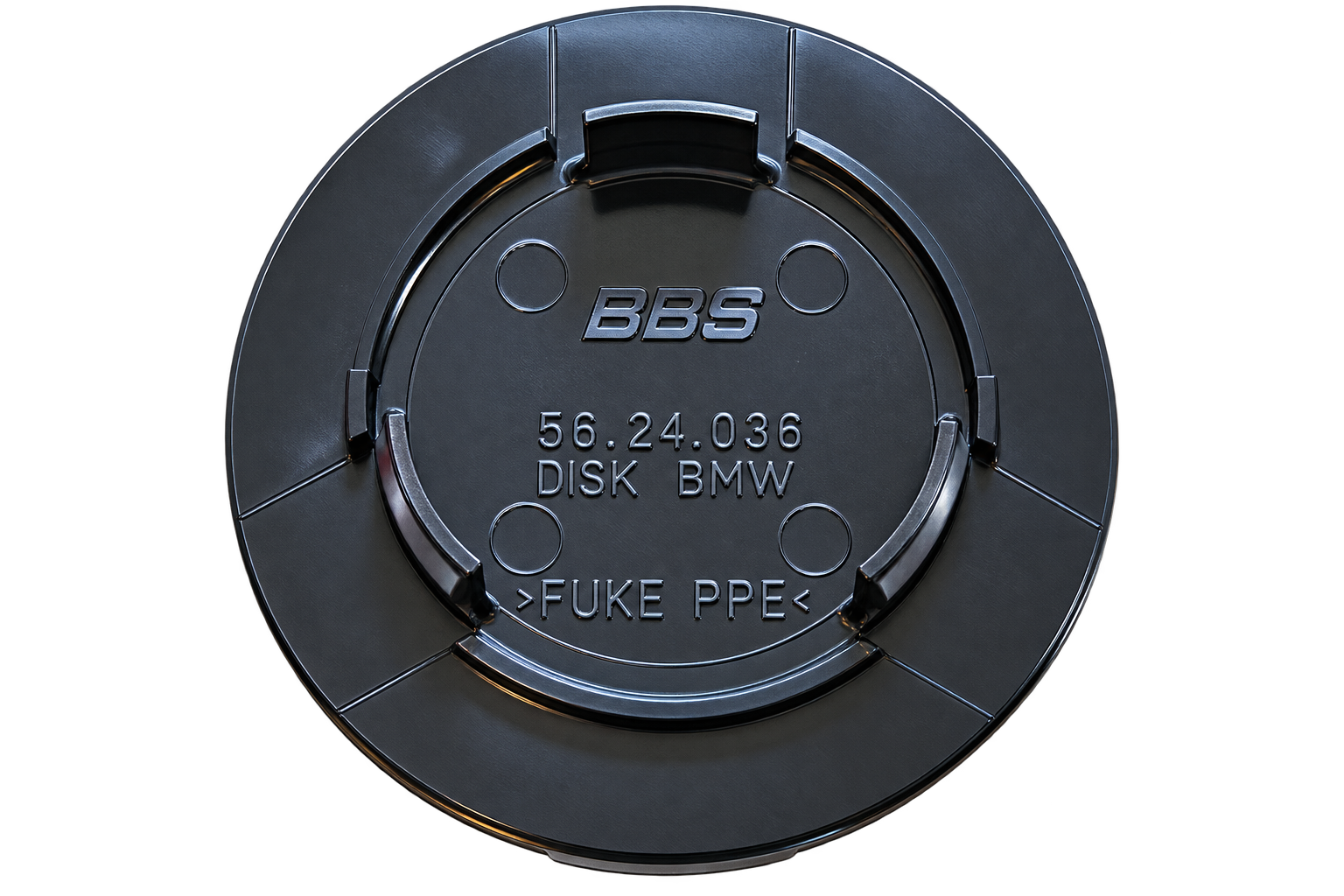 Backside of a BBS Type D center cap showing three retention tabs