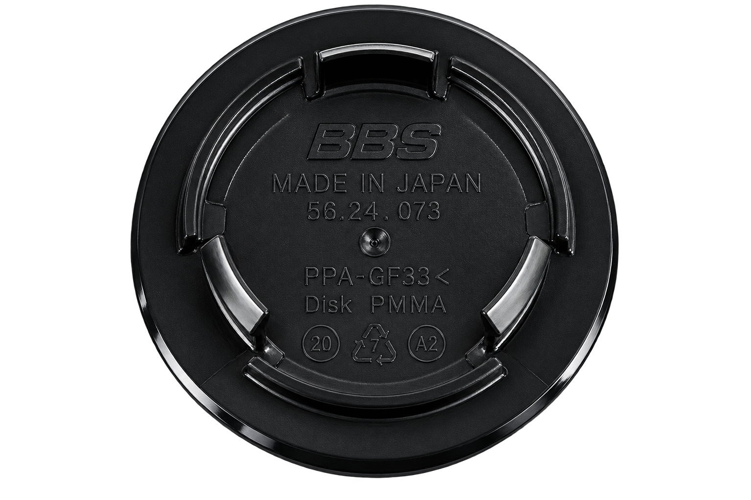 Backside of a BBS Type B center cap showing three retention tabs