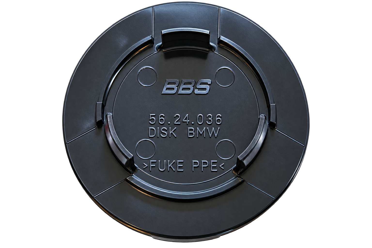 Backside of a BBS Type D center cap showing three retention tabs