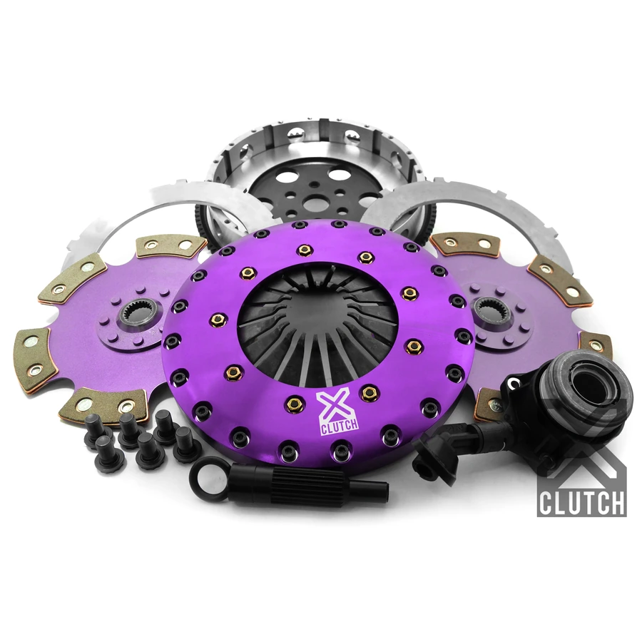Complete XClutch twin-disc clutch kit with two friction discs, pressure plate, flywheel, intermediate plates, release bearing, alignment tool, and hardware
