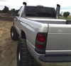 Black Cloud Diesel Performance customer Chris Douglas with 6 Inch Chrome Mitre Stacks on his 95 dodge 2500 single cab long bed 7 inch lift on 38's.