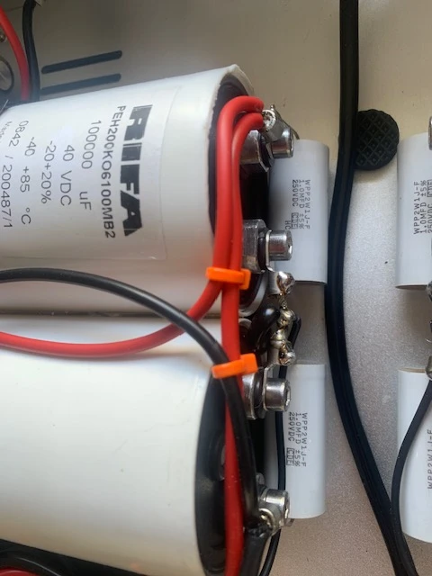 The massive 100,000uF 40V RIFA capacitors