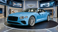 "Buy a Bentley EV. Charge for Free." | Sky Blue Bentley Empirean