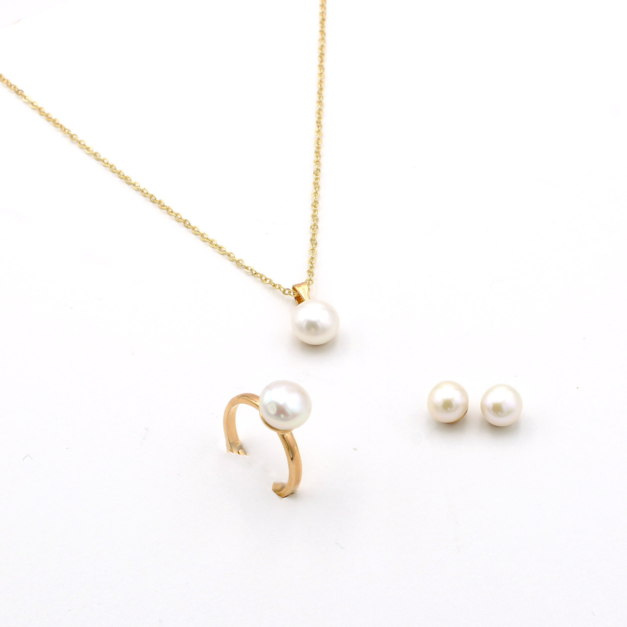 Tiffany T Smile Pendant and Earrings Set in Yellow Gold | Tiffany & Co.