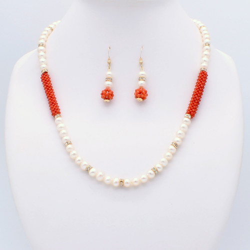 Round freshwater pearls with red coral clusters, necklace and earrings