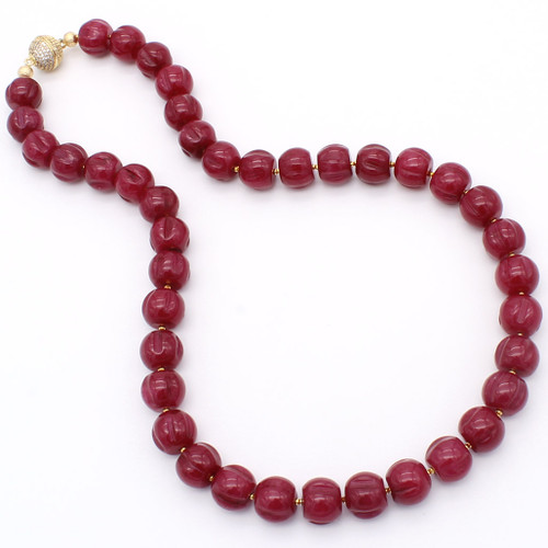 Red jade and 22k gold necklace at Abson Inc