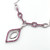 Sterling silver chain with faceted pink cubic zirconia in a pointed teardrop