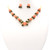 Hand-carved pink coral and jade matching necklace and earrings set