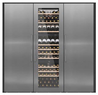 Caple WC1792 Wine Cooler with glass door showcasing multiple shelves of wine bottles in elegant sett