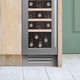 Caple GRILL/CLASS301 30cm Plinth Grille installed below a wine cooler for seemless integration
