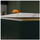 Sensio Edge External Corner Connector installed in a dark green kitchen
