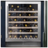 Caple WI6142 60cm Wine Cabinet filled with a variety of wines in a navy blue kitchen