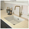 Abode Hex Single Lever Kitchen Tap in use on modern sink against black backsplash