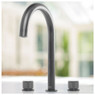 Caple JOY Joya 3 Part Kitchen Tap with curved neck and dual knobs on display in bright modern kitche