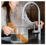 Using the Quooker Flex tap to fill a pot with boiling water for cooking spaghetti