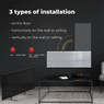 Aeno Premium 700W Smart Heater in a minimalist living room, showcasing installation both vertically 