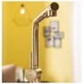 Modern Abode Fraction Pull Out Single Lever Tap on display in a modern yellow kitchen