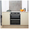 Whirlpool AKL307IX Double Oven installed in a kitchen with doors closed