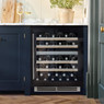 Caple WI6155 wine cooler with black glass door, seamlessly integrated into a modern kitchen.