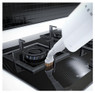 Aeno SM1 steam mop efficiently cleaning a modern gas hob