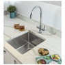 Abode Pronteau Prothia 3 in 1 Kitchen Tap in modern kitchen with tea and gingerbread on the counter