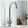 Pronteau ProTrad 4 in 1 Monobloc Kitchen Tap installed on a white worktop in bright kitchen