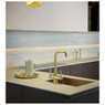 Abode Pronteau Propure 4 in 1 Monobloc Quad Kitchen Tap being used in a modern kitchen with a teapot