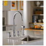 Abode Pronteau Profile 4 in 1 3-Part Kitchen Tap with spray nozzle on a granite countertop