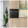 Caple CMS260 Combi Microwave Steam Oven in a modern kitchen with wooden cabinetry and marble counter