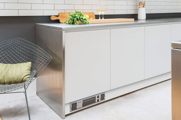 Space Saving Plinth Heater In Kitchen