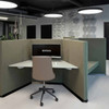 The Hive workstation has been designed to make the most of challenging layouts - medium green - front view - right side angle - in office.