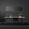 Abstracta Trumpet Lamp with Sound Absorber with LED light and uplight/downlight or dual-sided illumination -grey and green - downlight - front view - in office.