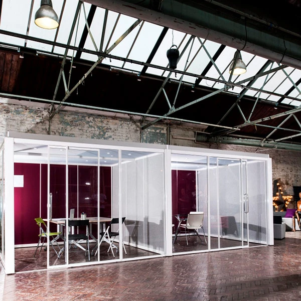 Glazed acoustic meeting booths in an open-plan office