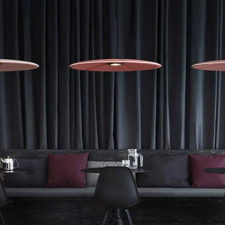 Abstracta Lily Acoustic Lamp and Sound Absorber with a dimmable LED light in the shape of lily water flowers - with lightning - white core - green - side view - in office. logo