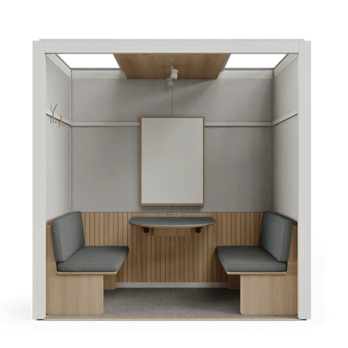 The acoustic booth designed by Room for meetings, brainstorming sessions and video conferences without any noise disruptions - inside view - black tabletop.