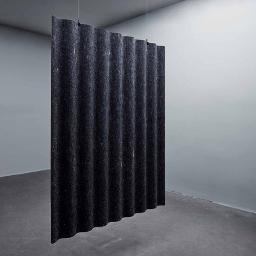 Abstracta Scala Hanging Sound Absorbing Dividers have the design of corrugated iron used for facades of the houses in Iceland - black.