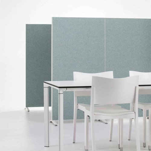 The Alumi acoustic screen adds a playful touch to space partitioning - solid green panels - front view - in office.