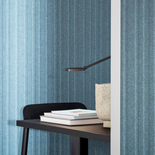 The Alumi acoustic screen adds a playful touch to space partitioning - vertical lines blue panels - details view - in office.