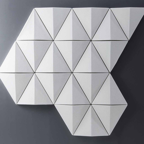 The Bits Wall by Abstracta transforma style into an acoustic formula for noise absorption and echo prevention  -  white panels - front view - on grey background.