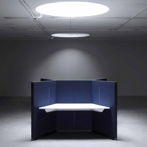 The Hive workstation has been designed to make the most of challenging layouts - dark blue and white tabletop - front view - in room.