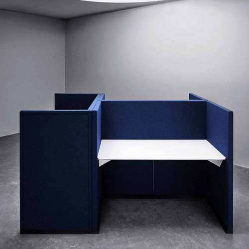 The Hive workstation has been designed to make the most of challenging layouts - dark blue and white tabletop - side and front view - in room.