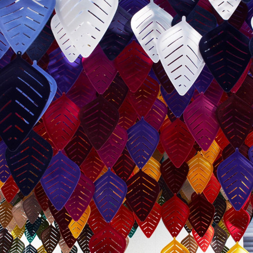 The Abstracta Airleaf gives an oasis appearance to the suspended sound-absorbing ceiling isle complementing open space offices - multicolour leaves - in office.